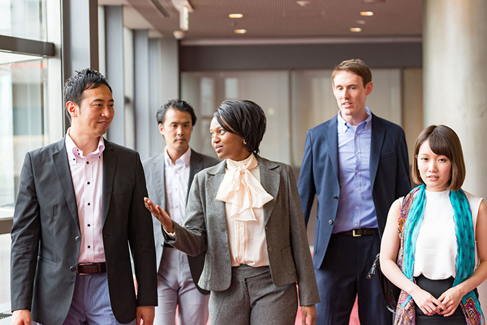 Photo of a group of business people from different ethnicities.